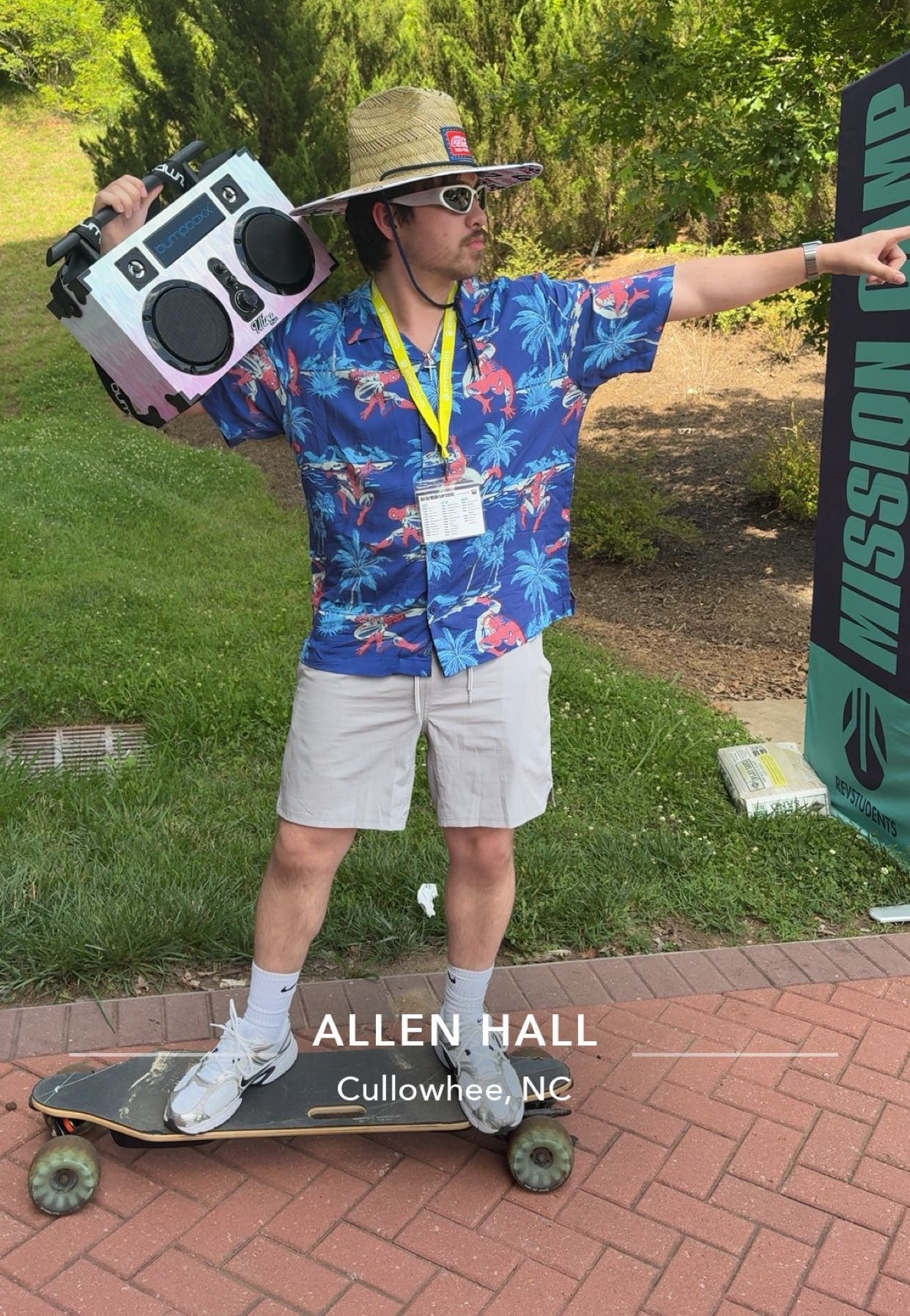 Young adult with a boombox and skateboard at RevGroups